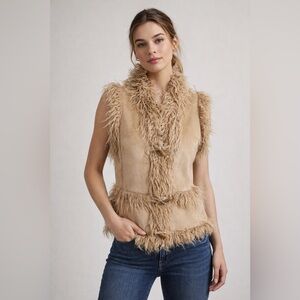 NEW INC Faux fur vest.
